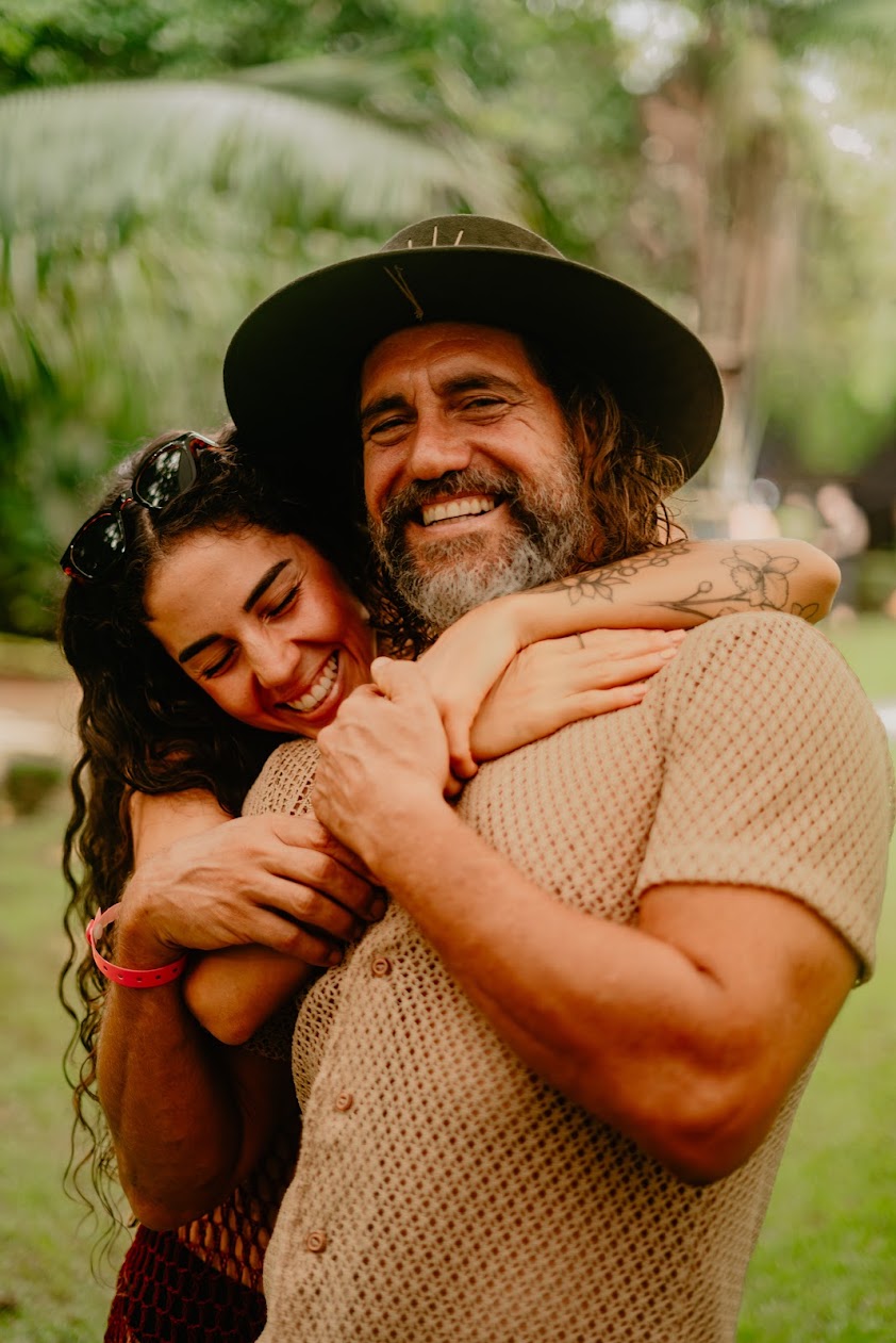Yoselyn and Lotus smiling and embracing